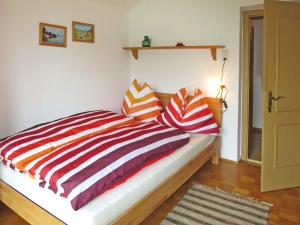 Postel nebo postele na pokoji v ubytování Holiday Home Lux by Interhome