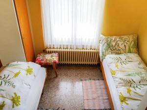 Ένα ή περισσότερα κρεβάτια σε δωμάτιο στο Holiday Home Carlo Cityview Lugano by Interhome +13 φωτογραφίες