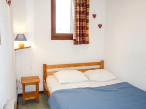 Un pat sau paturi într-o cameră la Apartment Les Hauts de St Gervais-3 by Interhome