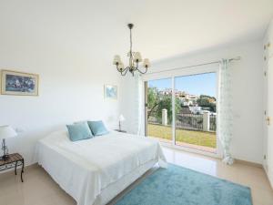 Postel nebo postele na pokoji v ubytování Holiday Home Villa Unica by Interhome