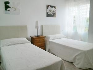 Posteľ alebo postele v izbe v ubytovaní Apartment Urbaeuropa by Interhome + 16 fotografií