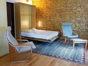 Säng eller sängar i ett rum på Apartment Crap Milan by Interhome