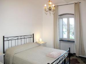 Apartment Vittoria e Milietto - FLG325 by Interhomeにあるベッド