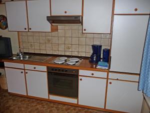 مطبخ أو مطبخ صغير في Apartment Scherzinger-2 by Interhome