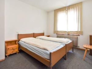 Ein Bett oder Betten in einem Zimmer der Unterkunft Apartment Benny-2 by Interhome