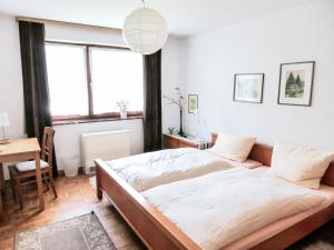 Apartment Der Malerwinkel-2 by Interhomeにあるベッド