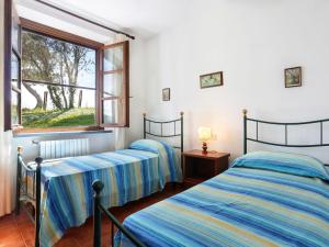 Posteľ alebo postele v izbe v ubytovaní Holiday Home Il Pescatore - TER103 by Interhome