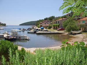 a group of boats are docked in a harbor at Apartment Šarenko-3 by Interhome in Vela Luka