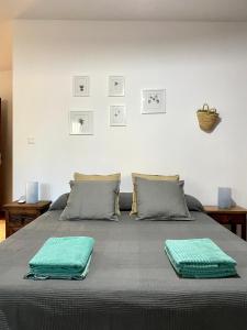 A bed or beds in a room at LAS PALMERAS