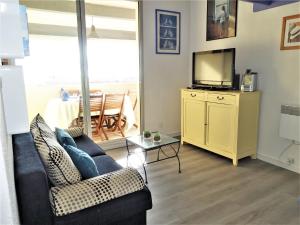 Μια τηλεόραση ή/και κέντρο ψυχαγωγίας στο Apartment Les Capounades-2 by Interhome