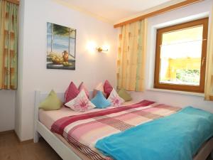 Postel nebo postele na pokoji v ubytování Apartment Anita-4 by Interhome
