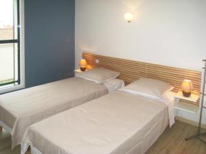 Ένα ή περισσότερα κρεβάτια σε δωμάτιο στο Apartment Les Epinettes by Interhome +15 φωτογραφίες