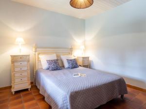 Postel nebo postele na pokoji v ubytování Holiday Home Poste by Interhome