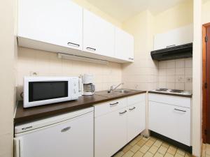 Η κουζίνα ή μικρή κουζίνα στο Apartment Ref- 702 by Interhome +13 φωτογραφίες