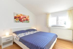 Posteľ alebo postele v izbe v ubytovaní Apartments Jere 719