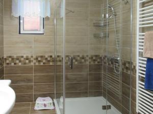 A bathroom at Holiday Home Emöke - BGK105 by Interhome