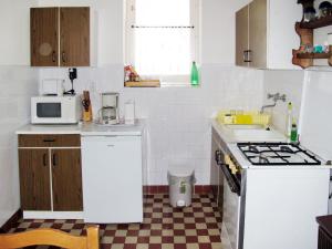 Køkken eller tekøkken på Holiday Home Sport by Interhome