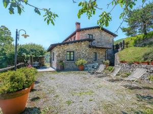 A garden outside Holiday Home Le Bore - CNG122 by Interhome