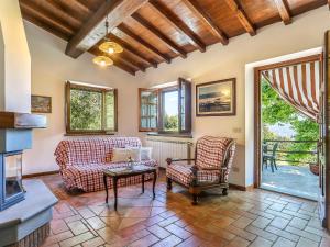 A seating area at Holiday Home Le Bore - CNG122 by Interhome