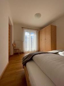 Кровать или кровати в номере Panoramic Residence Schopplhof