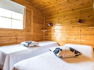 Postel nebo postele na pokoji v ubytování Holiday Home Niemenkärki- vaikon loma 8 by Interhome