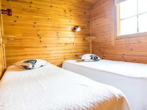 Ένα ή περισσότερα κρεβάτια σε δωμάτιο στο Holiday Home Niemenkärki- vaikon loma 8 by Interhome +27 φωτογραφίες