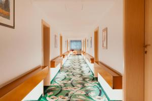 Voodi või voodid majutusasutuse Hotel Scherer toas