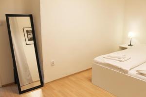 Postel nebo postele na pokoji v ubytování Modern apartment Michalska 6