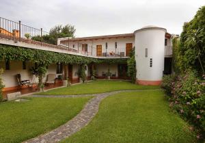 a view of the garden of a house at Chez Daniel in Antigua Guatemala