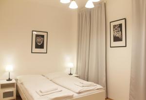 Postel nebo postele na pokoji v ubytování Modern apartment Michalska 6