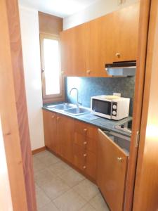 Kuchyňa alebo kuchynka v ubytovaní Ski Residence