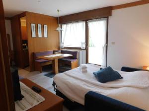 Posteľ alebo postele v izbe v ubytovaní Ski Residence