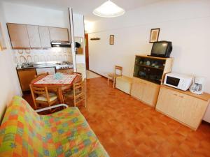 A kitchen or kitchenette at Apartment Solarium-2 by Interhome Még 22 kép