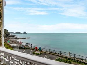 a view of the ocean from a balcony at Studio L'Abri des Flots by Interhome in Cancale +16 photos