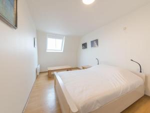 Postel nebo postele na pokoji v ubytování Apartment Duplex by Interhome