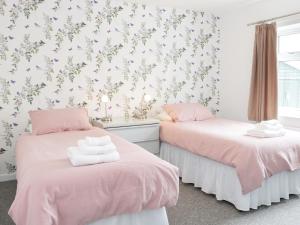 Ένα ή περισσότερα κρεβάτια σε δωμάτιο στο Glebeland