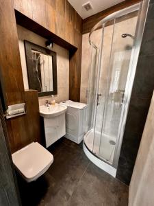 Koupelna v ubytování Apartament na Maja -2-