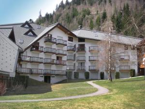 a view of a hotel with a mountain in the background at Studio La Borgia A- B- C-11 by Interhome in Les Contamines-Montjoie