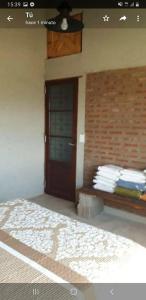 Ένα ή περισσότερα κρεβάτια σε δωμάτιο στο Yacanto360