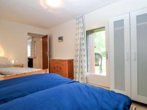 Postel nebo postele na pokoji v ubytování Apartment Fuchsbau-Top 2 by Interhome