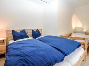 Postel nebo postele na pokoji v ubytování Apartment Fuchsbau-Top 2 by Interhome