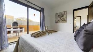 Posteľ alebo postele v izbe v ubytovaní Anju Villas Villas Vistas del Mar
