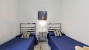 Posteľ alebo postele v izbe v ubytovaní Anju Villas Villas Vistas del Mar
