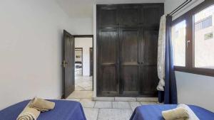 Posteľ alebo postele v izbe v ubytovaní Anju Villas Villas Vistas del Mar