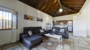 Posedenie v ubytovaní Anju Villas Villas Vistas del Mar