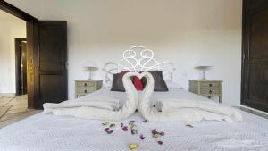 Posteľ alebo postele v izbe v ubytovaní Anju Villas Villas Vistas del Mar
