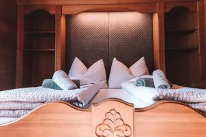Postel nebo postele na pokoji v ubytování Alpenherz Chalet