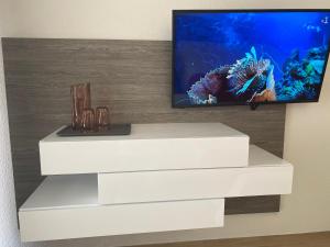 TV o dispositivi per l'intrattenimento presso Diamantchery - Vue mer avec Deck privatif