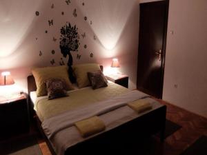 Postel nebo postele na pokoji v ubytování Apartments & Rooms Rendulić