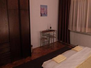 Postel nebo postele na pokoji v ubytování Apartments & Rooms Rendulić